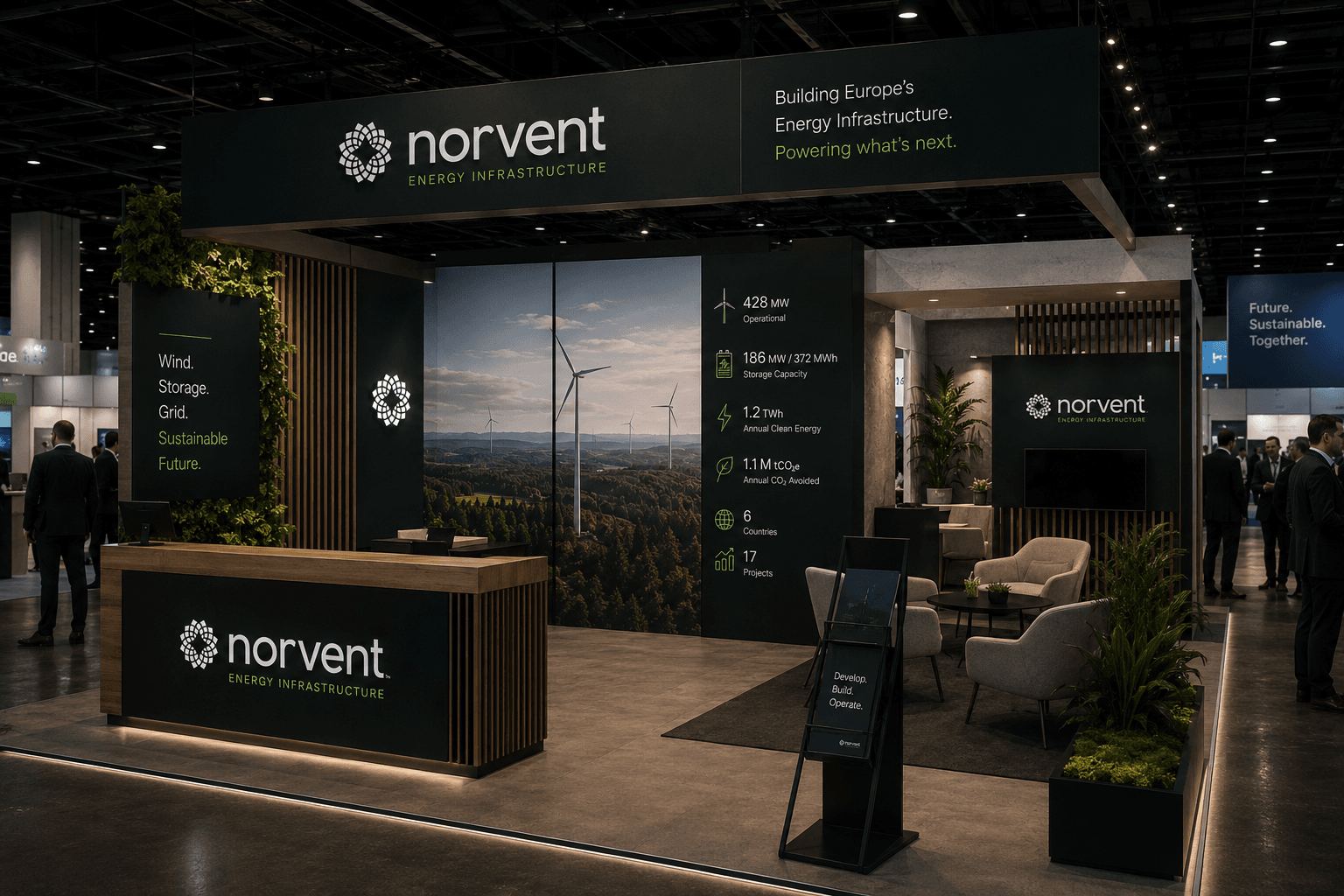 The Norvent trade show stand — a green backdrop of wind turbines with capacity, storage and project figures, a planted meeting lounge and a branded welcome desk